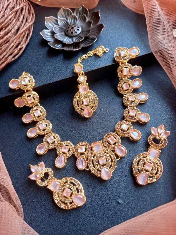 Necklace set with earrings and tikka